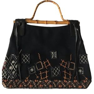 BCBG MAXAZRIA CANVAS EMBROIDERED HAND‎ BAG WITH BAMBOO HANDLE. BLACK